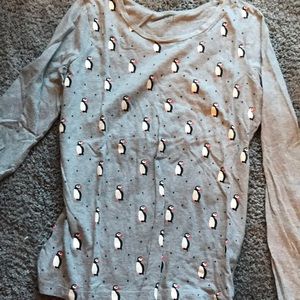 A comfortable grey shirt with Puffins on it